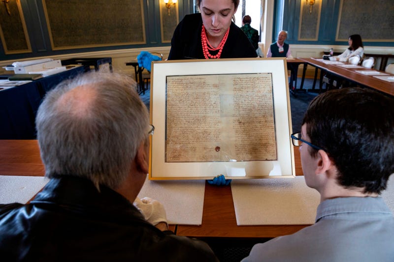Inventors marvel at Benjamin Franklin’s will at the Franklin Institute.