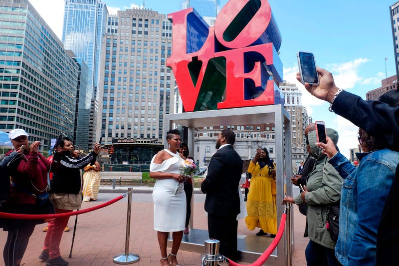 Claire Louis and Tyhim Hawkins get married at Love Park on April 10, 2019.
