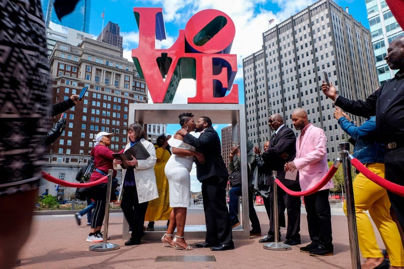 Claire Louis and Tyhim Hawkins get married at Love Park on April 10, 2019.