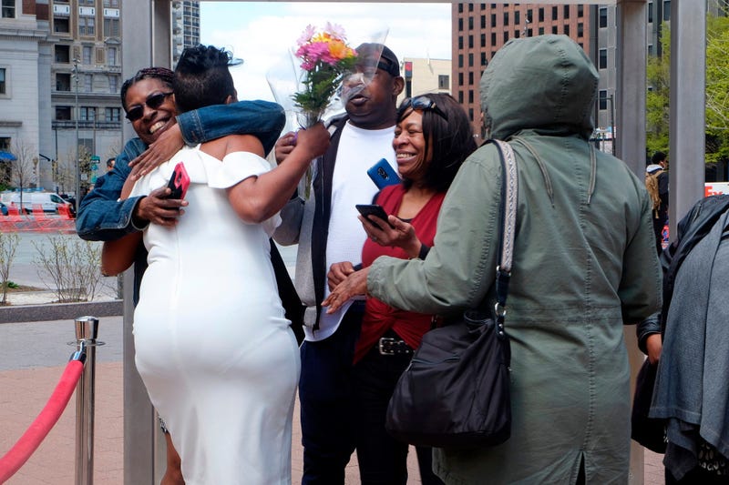 Claire Louis and Tyhim Hawkins get married at Love Park on April 10, 2019.