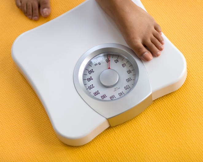 when to step on the scale