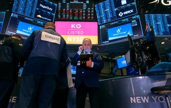 Traders work on the floor of the New York Stock Exchange Thursday, Feb. 27, 2020. (AP Photo/Craig Ruttle)