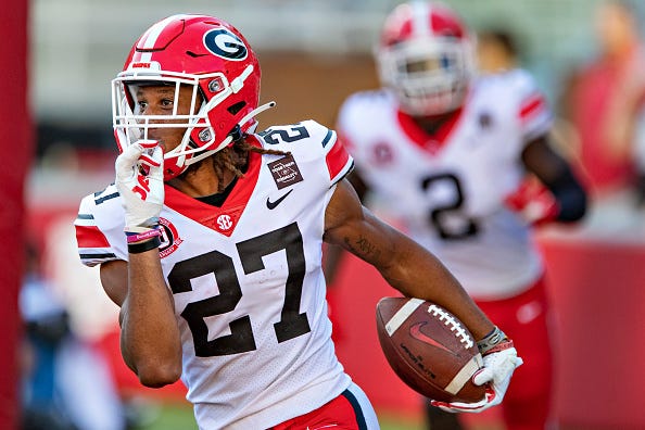CB Eric Stokes of Georgia celebrates an INT. 
