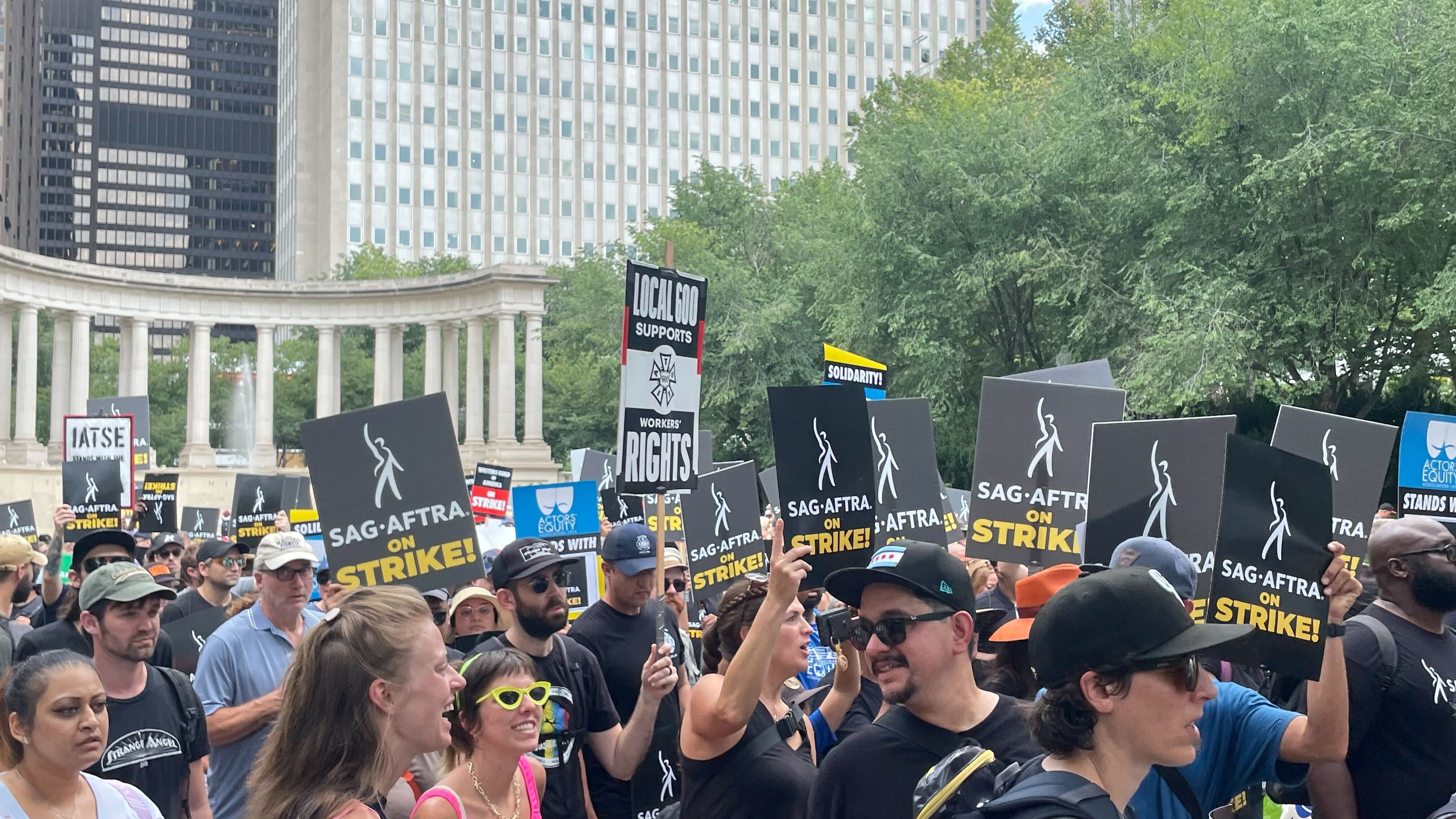 SAG-AFTRA, WGA members demonstrate in Chicago as production halt drags on