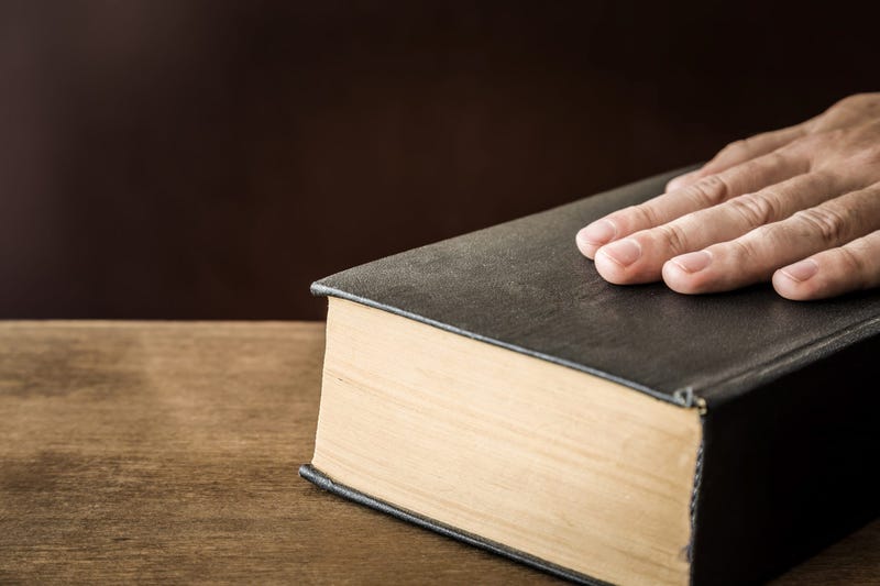 hand on bible
