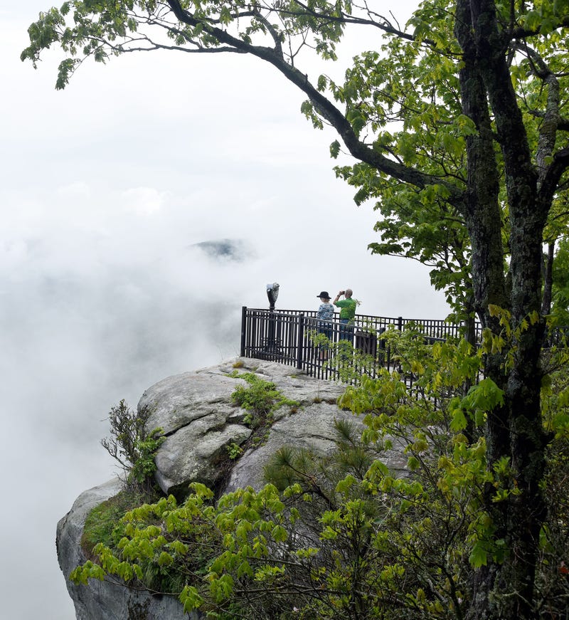 People take in the view of Table Rock from an observation deck at Caesers Head State Park. 1018 Tg Outdoor 6