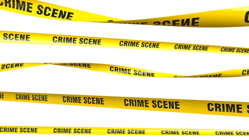 Yellow crime scene tapes hanging and blocking access - stock photo