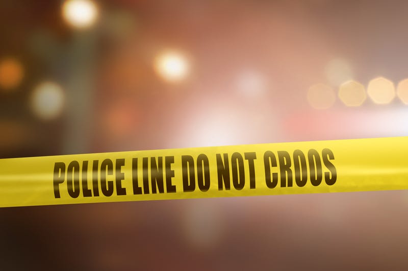 Yellow police line tape sign for protection of a crime scene