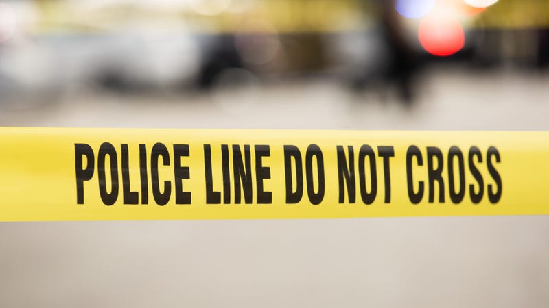 Police line cordon tape at a crime scene - stock photo