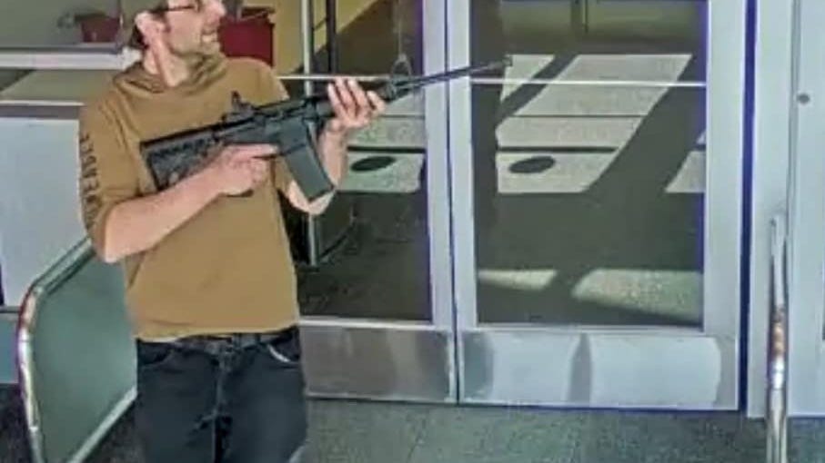 Man with rifle, 13 loaded magazines fatally shot by police at Target