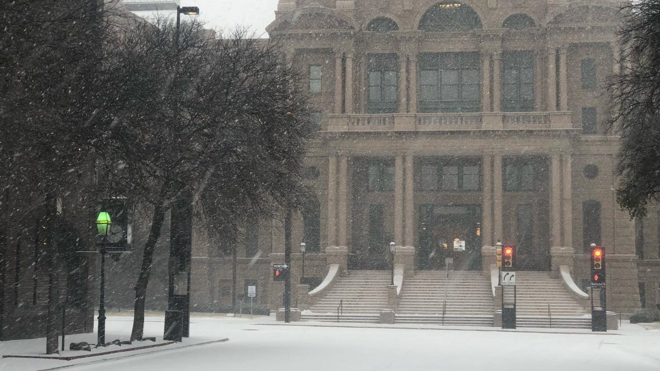 Some Fort Worth residents find photo opportunity with ice and snow