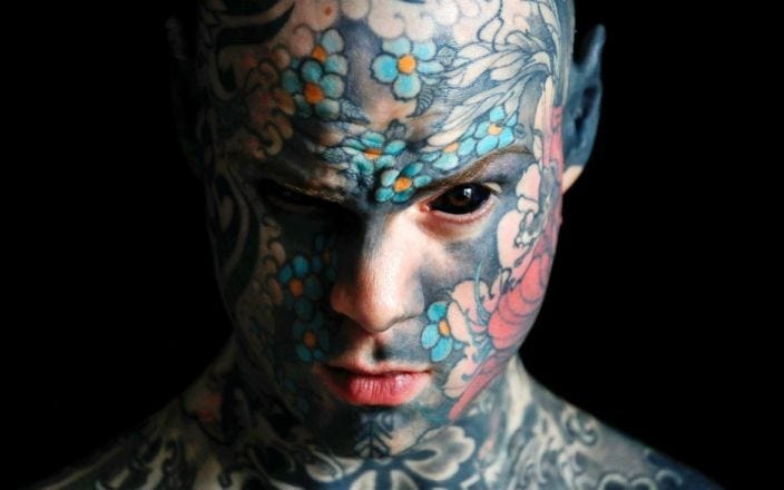 Osterlind: Teacher Says Tattoos Cost Him His Job
