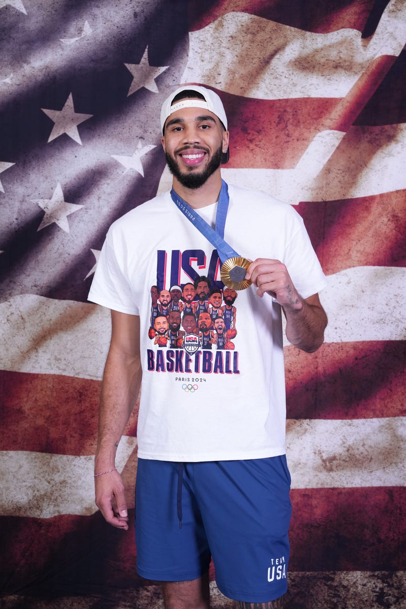 Jayson Tatum with his Olympic gold medal.