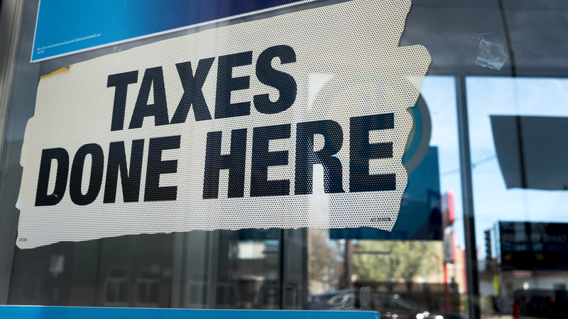 Signs advertise services at a tax preparer's office
