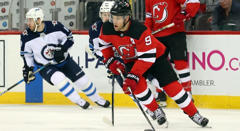 The Devils' Taylor Hall skates with the puck against the Winnipeg Jets on March 9, 2018, at the Prudential Center. 