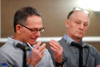 Tad Deluca, a University of Michigan wrestler from the 1970s, speaks during a news a news conference. He says he was kicked off the team and lost his financial aid after complaining that he had been abused by a sports doctor. (AP Photo/Carlos Osorio)