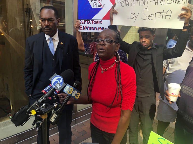 Philadelphia NAACP President Rodney Muhammad and former SEPTA employee Tera Bryant address reporters outside SEPTA headquarters.