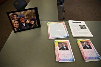 FILE - In this Dec. 21, 2019 file photo, photos, articles and letters are laid out on display before a ceremony honoring Tessa Majors at St. Anne's Belfield School in Charlottesville, Va. (Erin Edgerton/The Daily Progress via AP, File)