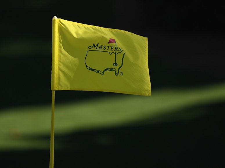 The flag on the 10th green blows in the wind during the second round of The Masters golf tournament at Augusta National Golf Club