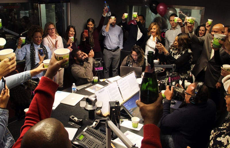 V-103's staff toasts The Morning Culture on the show's first day on air