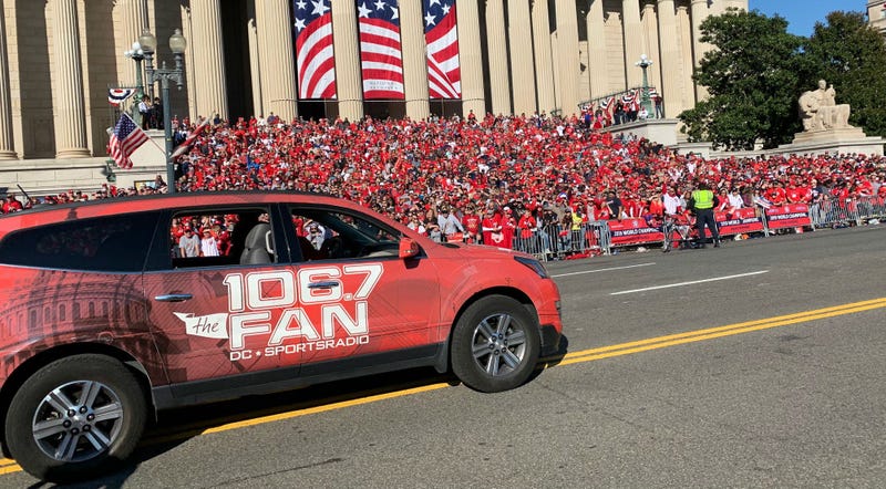 A 106.7 The Fan station vehicle drives through the Washington Nationals parade on Saturday, November 1.