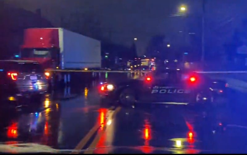 An early morning crash involving a vehicle and a semi ended with two people dead in Detroit on Friday, authorities confirmed.