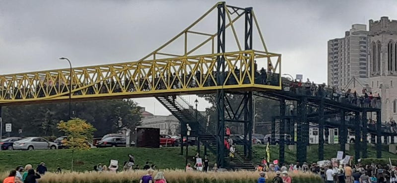 Marchers on bridge
