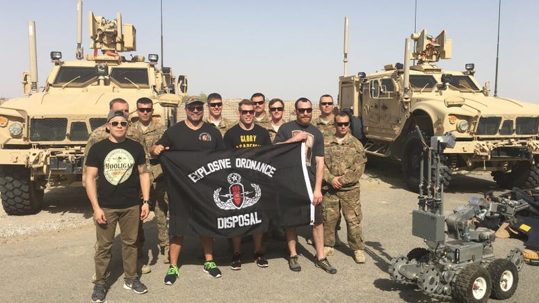 Titan FC COO Lex McMahon and Titan FC Fighters visit with EOD troops on a 2016 visit to Kuwait