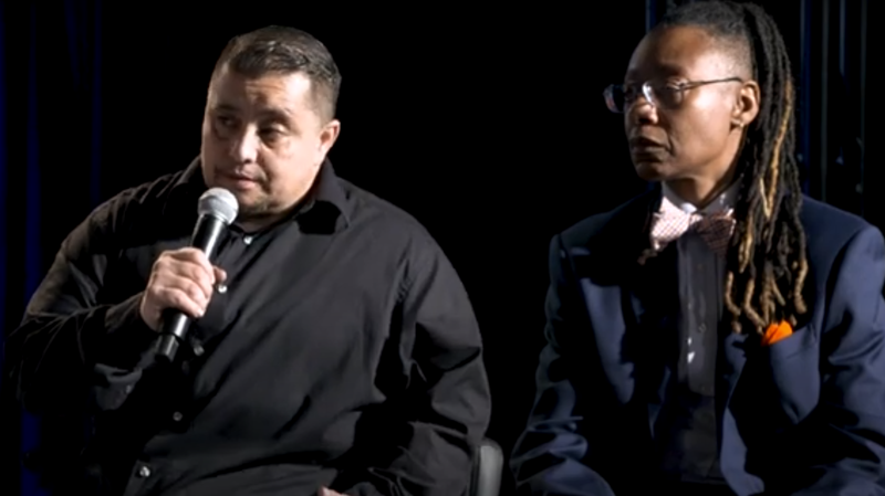 two people onstage