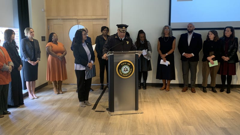 Police Commissioner Kevin Bethel (front right) and City Councilmember Nina Ahmad (front left) discuss human trafficking and Philadelphia's developing response to the problem.