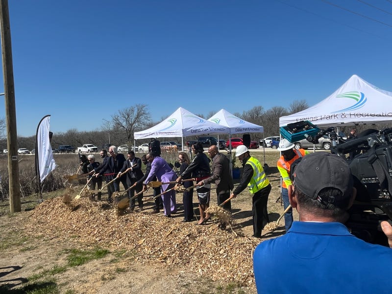 Officials break ground on a trail extension in southern Dallas County on Wednesday, Feb. 21, 2024.