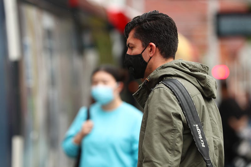 Masks at a train station