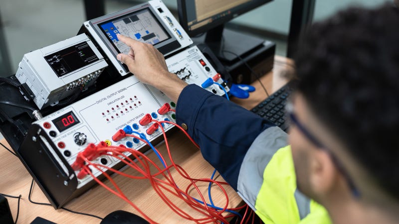 Learning with electric and computer programming in class - stock photo