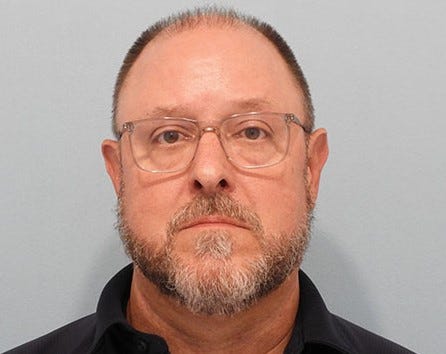 John R. Miller booking photo