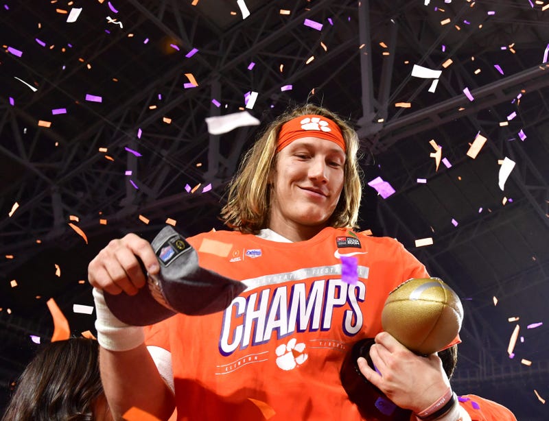 Dec 28, 2019; Glendale, AZ, USA; Clemson Tigers quarterback Trevor Lawrence (16) celebrates after defeating the Ohio State Buckeyes in the 2019 Fiesta Bowl college football playoff semifinal game at State Farm Stadium. Mandatory Credit: Matt Kartozian-USA