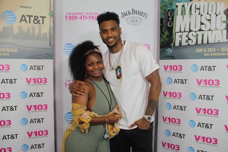 Trey Songz takes a photo with fans