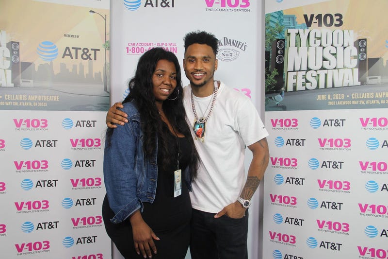 Trey Songz takes a photo with fans