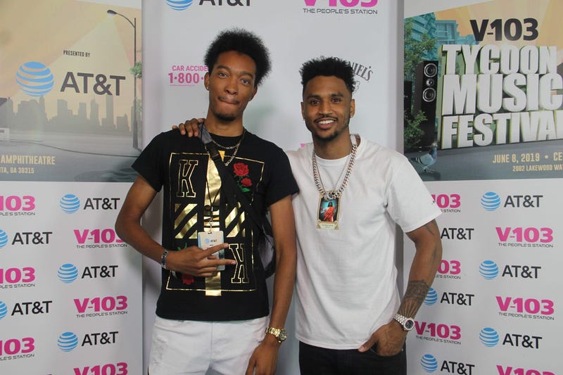 Trey Songz takes a photo with fans