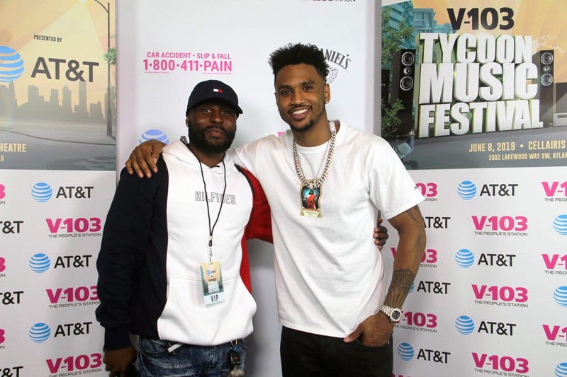 Trey Songz takes a photo with fans