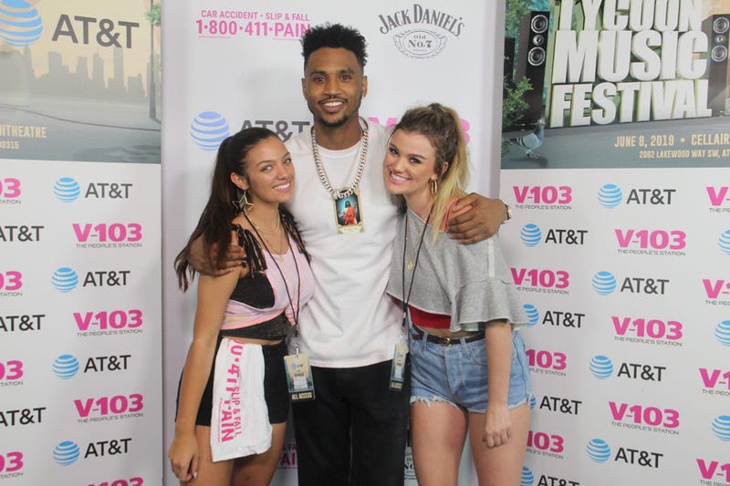 Trey Songz takes a photo with fans
