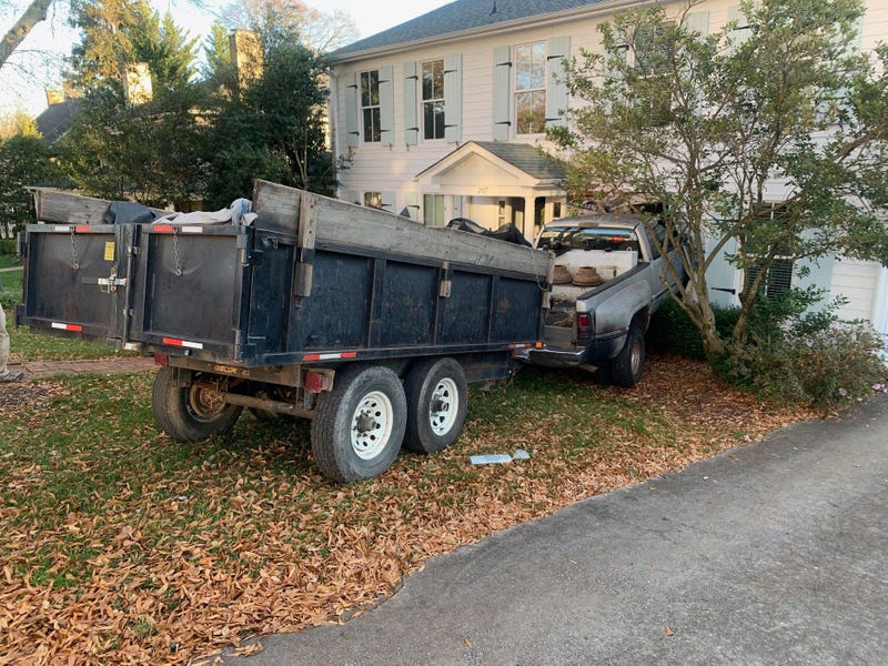 Truck rolls into home, no one hurt.