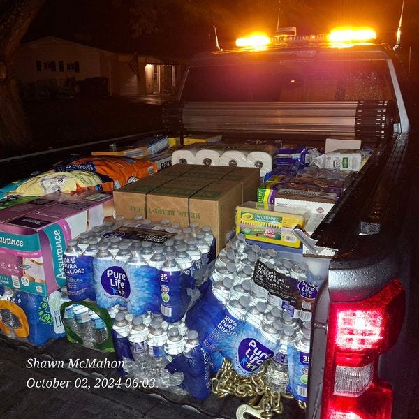 More supplies in Tim Berry's pick up truck