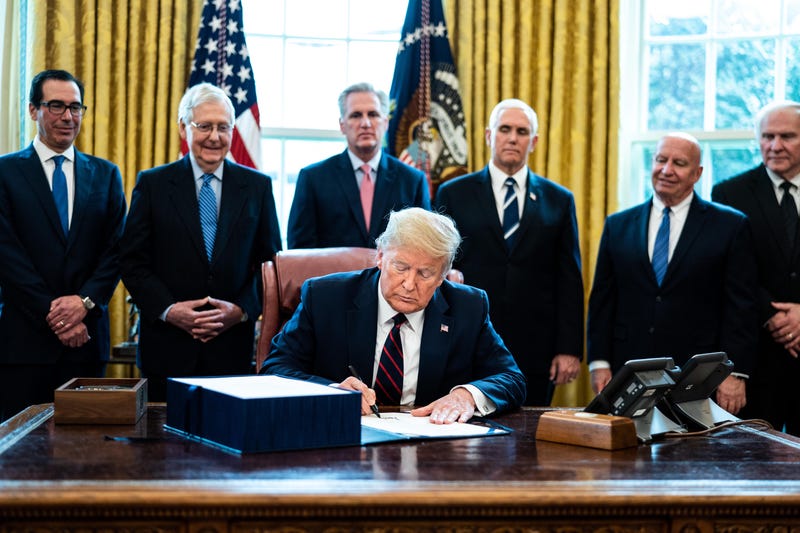 Trump Signs COVID 19 Aid Bill 