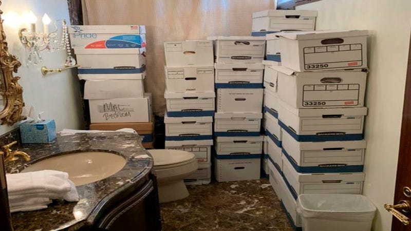 Stacks of boxes in a bathroom