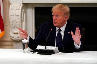 President Donald Trump tells reporters that he is taking zinc and hydroxychloroquine during a meeting with restaurant industry executives about the coronavirus response. (AP Photo/Evan Vucci)