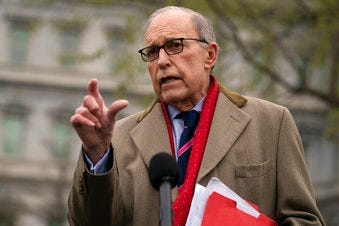 White House chief economic adviser Larry Kudlow talks with reporters about economic impacts of the coronavirus, at the White House, Tuesday, March 24, 2020, in Washington. (AP Photo/Evan Vucci)