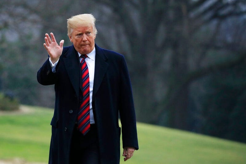 President Donald Trump walks on the South Lawn upon arrival at the White House in Washington, Saturday, Jan. 19, 2019