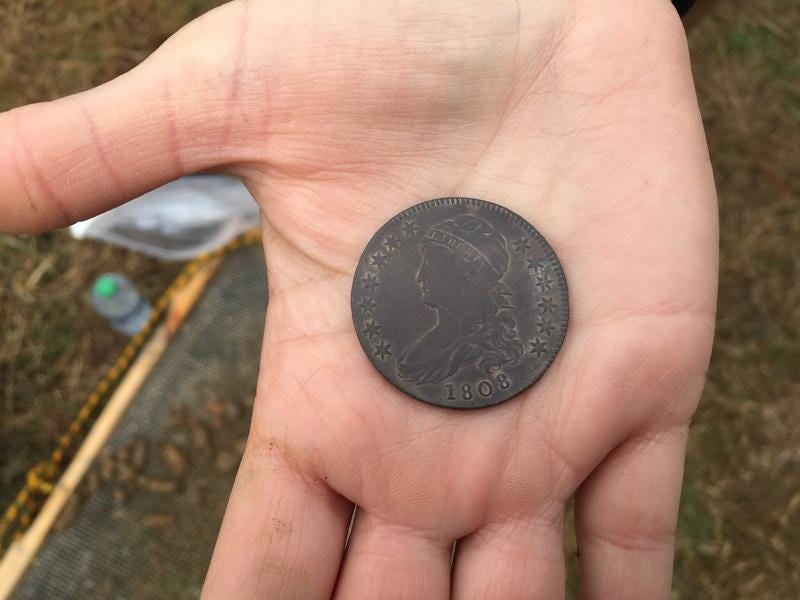 In this image provided by the Maryland Department of Transportation, an 1808 coin is shown that was found at a site on Maryland’s Eastern Shore, is displayed on March, 25, 2021.