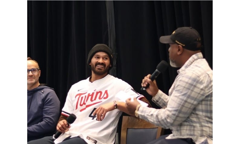 Minnesota Twins TV voice Cory Provus (L), Twins Pitcher Pablo Lopez (C) and WCCO's Henry Lake (R) at TwinsFest in 2025.