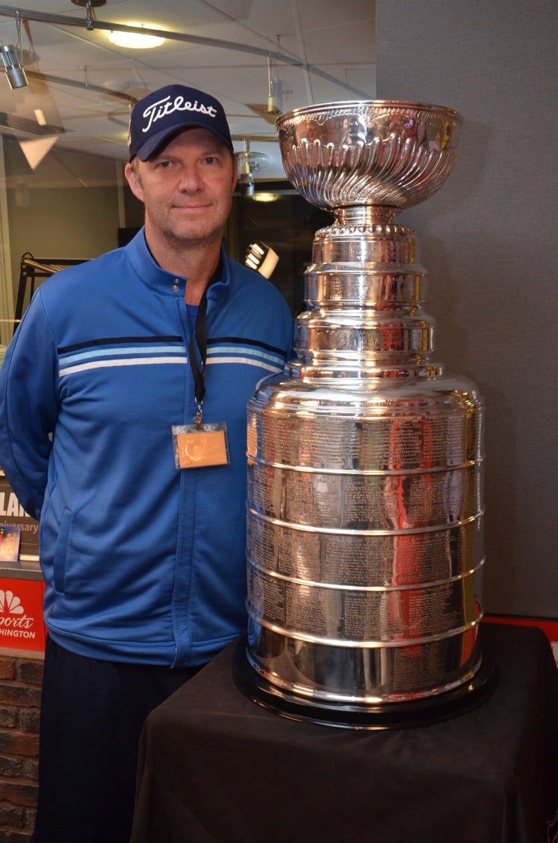 Bish poses with the Stanley Cup